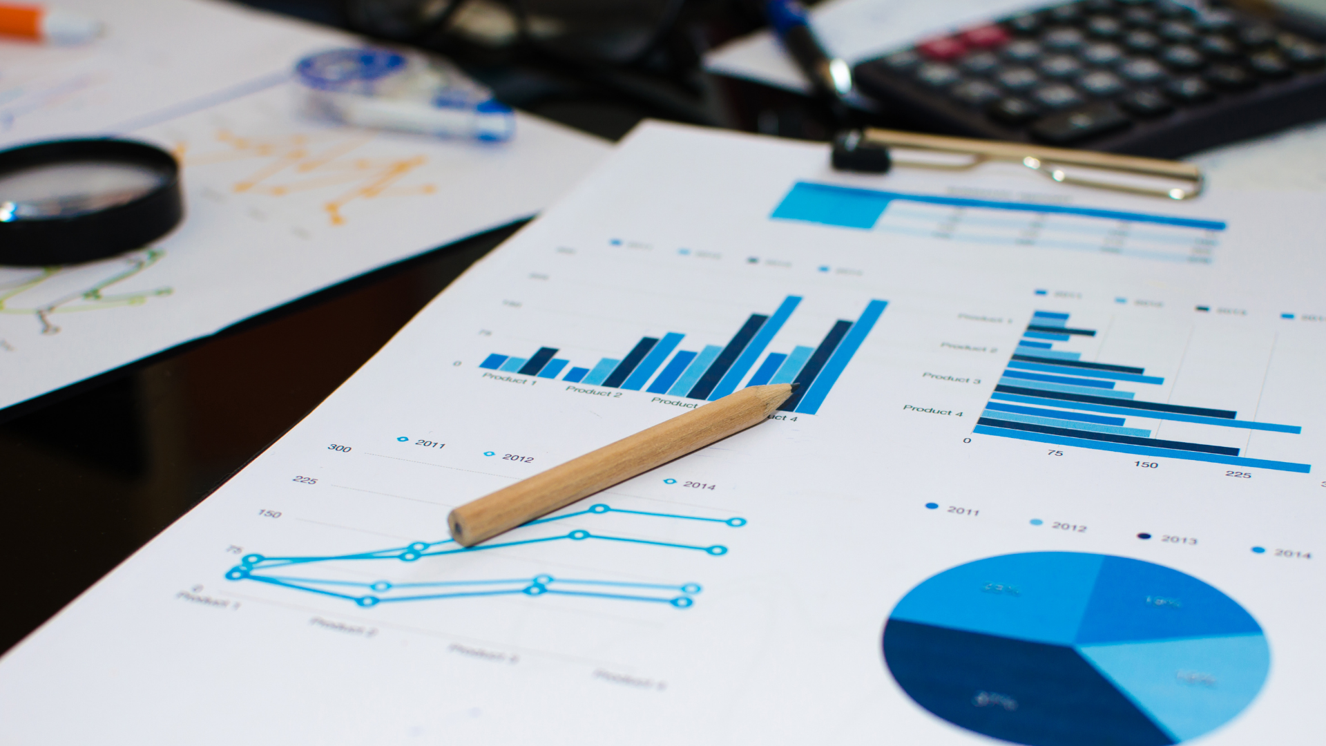 A lit gallery room with focus on a central piece